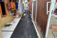 Disperkim Kabupaten Sukabumi laksanakan pengaspalan jalan lingkungan di Kampung Selajambe untuk mendukung akses dan aktivitas ekonomi warga.