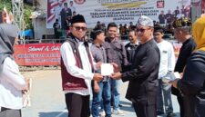 Asda II Fuji Widodo menghadiri puncak Hari Nelayan Cisolok ke-28 di TPI Pajagan.